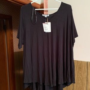 Loose fitting asymmetrical top